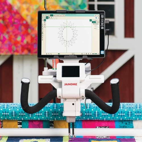 Longarm quilting machine with digital design screen.